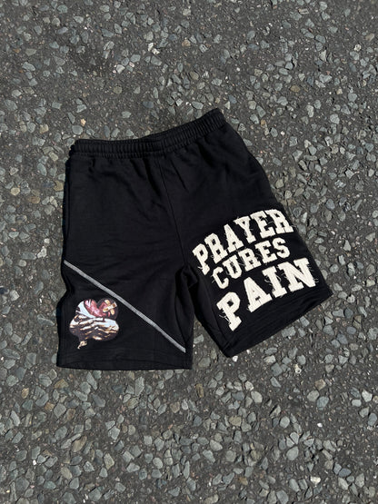 PRAYER CURES PAIN SHORTS BLACK